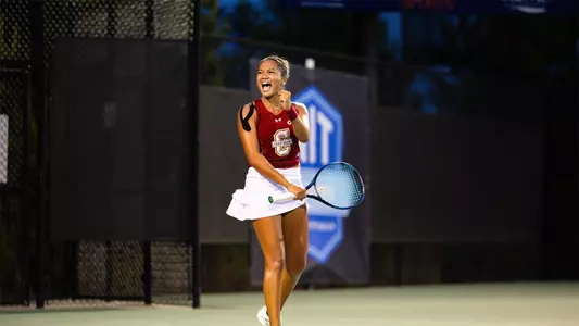 Oziera Ahmad celebrates winning a point