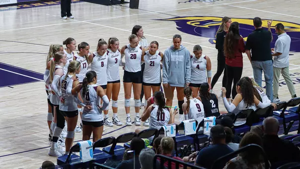 Charleston volleyball huddle Aug 29, 2026 at Lipscomb.
