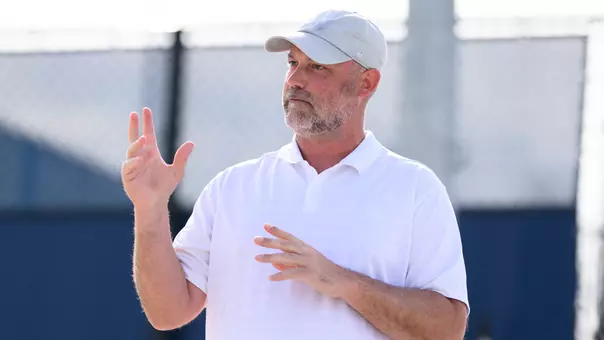Ryan Rasco coaching tennis