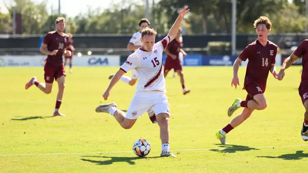 Stian Bendvold kicks soccer ball