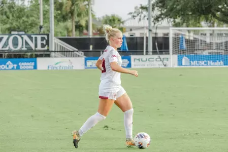 Lyla Schick kicking the ball