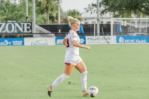 Lyla Schick kicking the ball