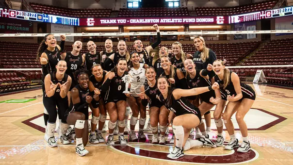 Charleston Volleyball team photo with the 2026 Steve Baumrind Invitational Trophy