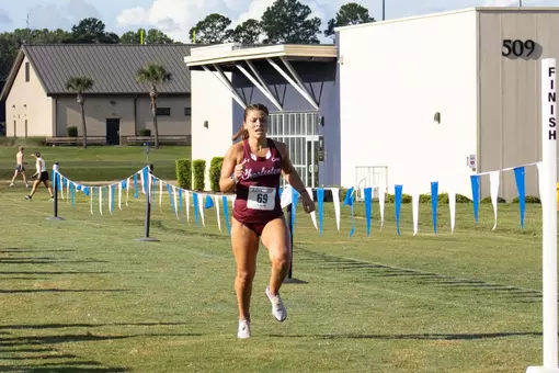 Lauren Resnick crossing finish line