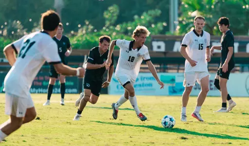 Hogan Walker controls the ball
