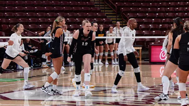 Caroline Noonan celebrating a point against Towson.