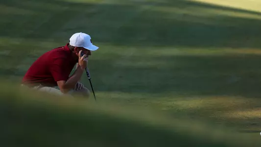 Roelof Craig looking at a putt behind the green.