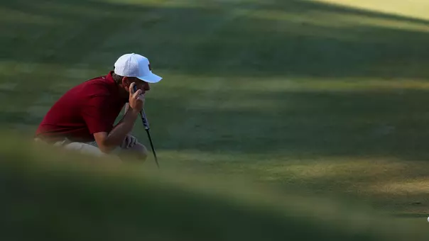 Roelof Craig looking at a putt behind the green.