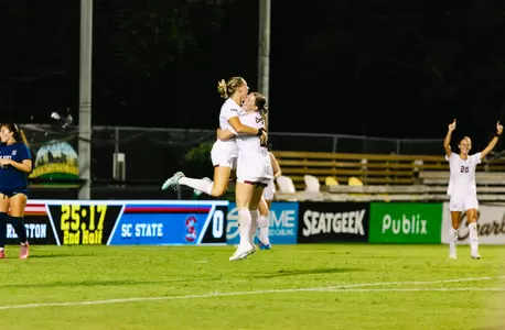 Team celebrating after a goal
