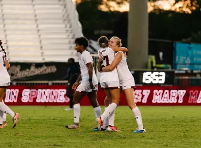 Mary Martin Spinner hugging Chloe Nelson
