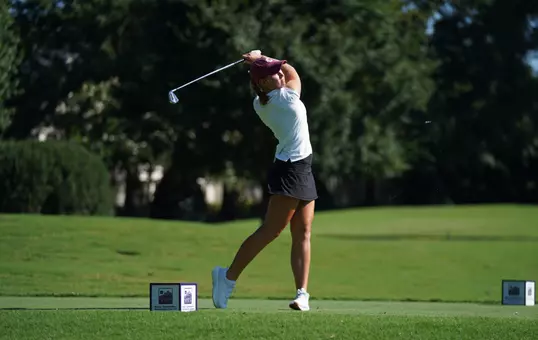 Carys Fennessy swings at the tee box