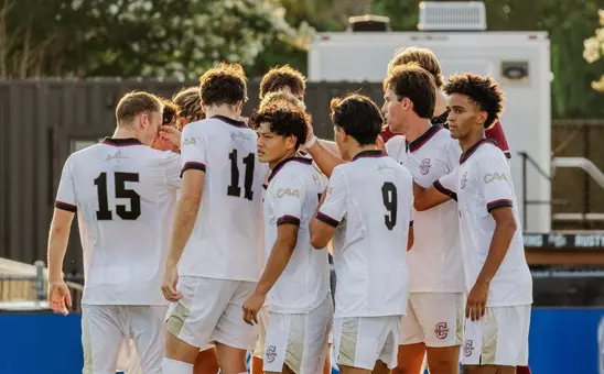 Men's soccer team huddle