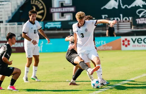 Julian Jordheim battles a defender