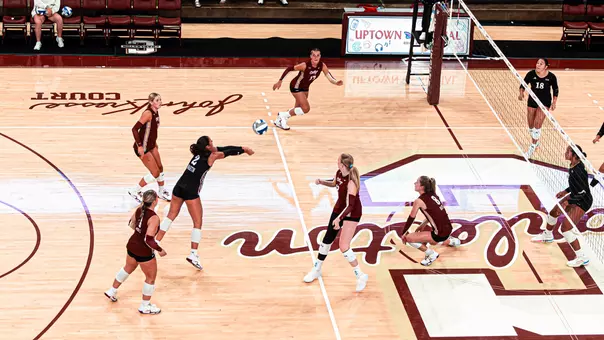 Sophomore JuJu Martin digging a ball at TD Arena.
