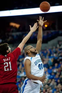 Men's Basketball Races Past Huskies, 97-62