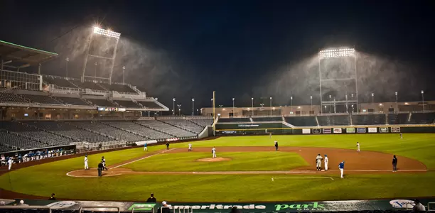 TD Ameritrade Park Omaha night rain