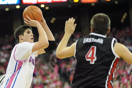 Young & McDermott Lead Men's Basketball To Narrow Win