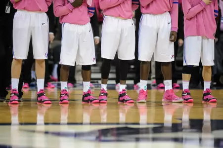 Pink shoes, pink-trimmed jerseys, pink warm-up tops