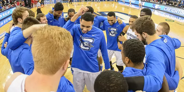Ronnie Harrell leads the MBB huddle