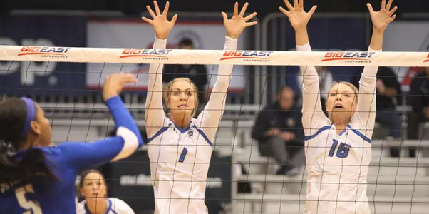 Lydia Dimke and Lauren Smith block