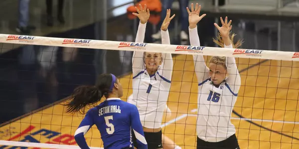 Lydia Dimke and Lauren Smith block