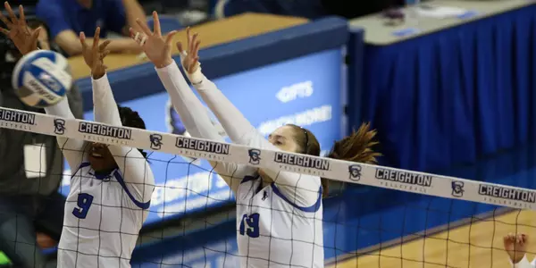 Marysa Wilkinson and Megan Ballenger block