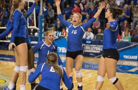 Lauren Smith leads the volleyball celebration