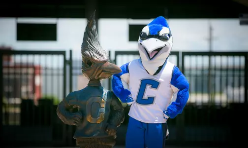 Billy Bluejay with Billy Bluejay statue