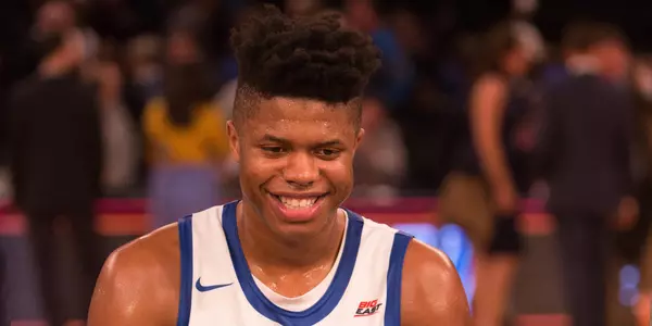 Justin Patton with FOX microphone interview media