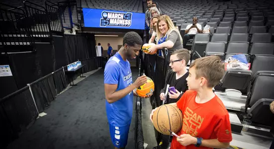 Cole Huff signs an autograph