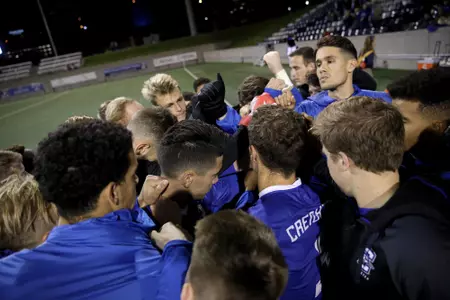 Men's Soccer Team Huddle
