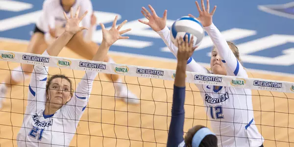 Naomi Hickman and Taryn Kloth block