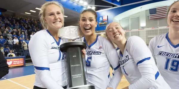 Taryn Kloth and Jaali Winters and Kari Zumach trophy champions vbcelebrate celebrate