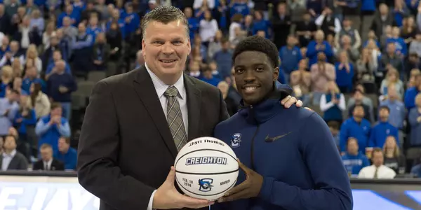 Greg McDermott and Khyri Thomas 1,000 point ball
