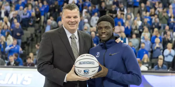 Greg McDermott and Khyri Thomas 1,000 point ball