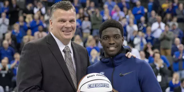 Greg McDermott and Khyri Thomas 1,000 point ball
