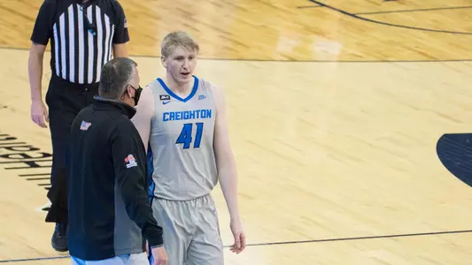 Jacob Epperson with Greg McDermott