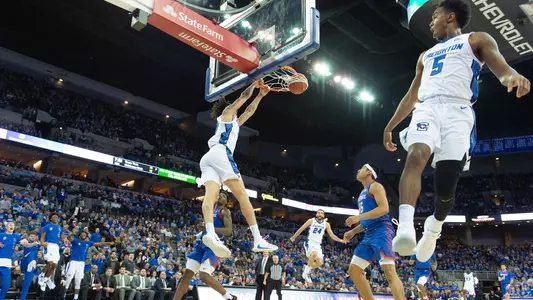 Bishop dunk, Alexander and Ballock celebrate
