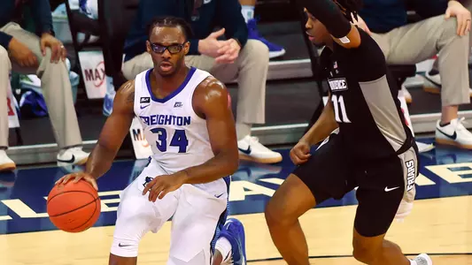 Jan 20, 2021; Omaha, Nebraska, USA;  Creighton Bluejays guard Denzel Mahoney (34) drives on Providence Friars guard A.J. Reeves (11) in the second half at CHI Health Center Omaha. Mandatory Credit: Steven Branscombe-USA TODAY Sports