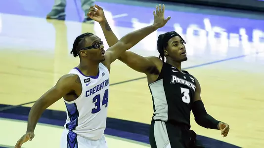 Jan 20, 2021; Omaha, Nebraska, USA;  Providence Friars guard David Duke (3) watches a three point attempt with Creighton Bluejays guard Denzel Mahoney (34) in the second half at CHI Health Center Omaha. Mandatory Credit: Steven Branscombe-USA TODAY Sports