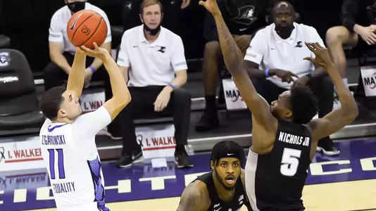 Jan 20, 2021; Omaha, Nebraska, USA;  Creighton Bluejays guard Marcus Zegarowski (11) attempts a shot over Providence Friars forward Jimmy Nichols Jr. (5) in the first half at CHI Health Center Omaha. Mandatory Credit: Steven Branscombe-USA TODAY Sports