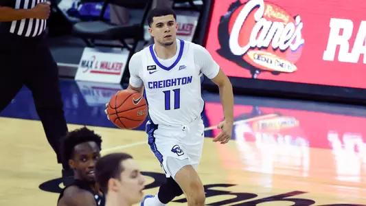 Jan 20, 2021; Omaha, Nebraska, USA;  Creighton Bluejays guard Marcus Zegarowski (11) dribbles against the Providence Friars in the first half at CHI Health Center Omaha. Mandatory Credit: Steven Branscombe-USA TODAY Sports