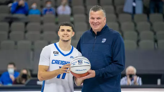 Marcus Zegarowski 1,000 point ball with Greg McDermott