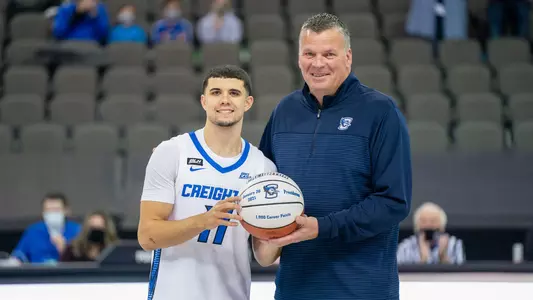 Marcus Zegarowski 1,000 point ball with Greg McDermott