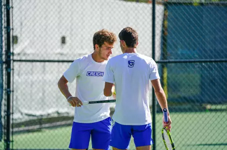 In day two of the Bluejay Invitational Men's Tennis matches between the Creighton Bluejays, Drake, North Dakota and University of Nebraska-Omaha played on September 25, 2021, at the Koch Family Tennis Center in Omaha, Nebraska. The Bluejays wrapped up play with a number of doubles and singles victories. (Catherine Grosdidier/ Creighton Athletics)