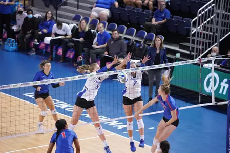 Kiana Schmitt and Jaela Zimmerman block