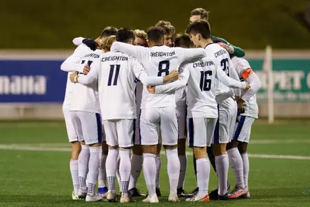 Men's Soccer team huddle