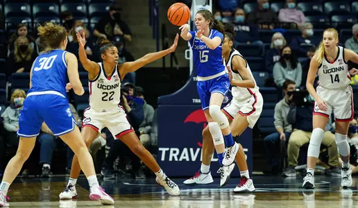 Jan 9, 2022; Storrs, Connecticut, USA; Creighton Bluejays guard Lauren Jensen (15) passes the ball to guard Morgan Maly (30) against the UConn Huskies in the first half at Harry A. Gampel Pavilion. Mandatory Credit: David Butler II-USA TODAY Sports