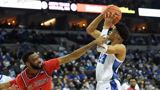 Jan 19, 2022; Omaha, Nebraska, USA;  St. John's Red Storm forward Aaron Wheeler (1) fouls Creighton Bluejays guard Trey Alexander (23) in the second half at CHI Health Center Omaha. Mandatory Credit: Steven Branscombe-USA TODAY Sports