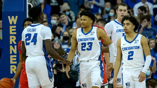 Jan 19, 2022; Omaha, Nebraska, USA;  Creighton Bluejays guard Trey Alexander (23) celebrates with guard Ryan Nembhard (2) and center Ryan Kalkbrenner (11) and forward Arthur Kaluma (24) against the St. John's Red Storm in the first half at CHI Health Center Omaha. Mandatory Credit: Steven Branscombe-USA TODAY Sports